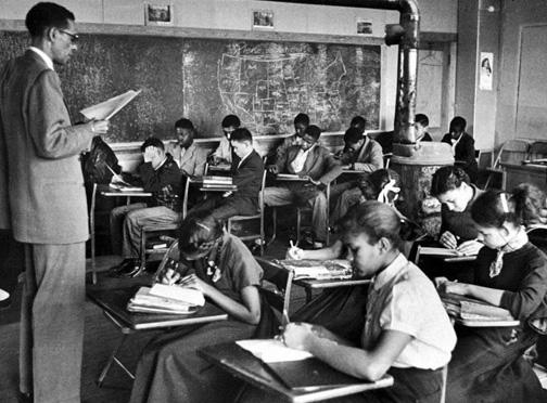 Students study in an all-Black segregated school