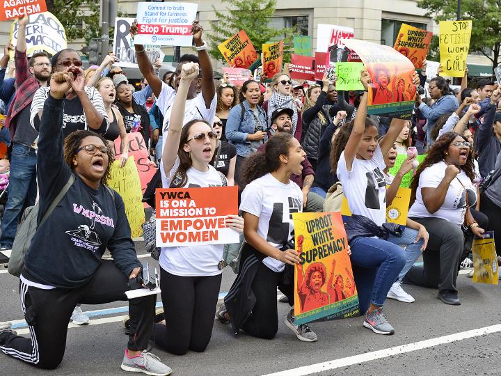 Protesters take a knee during the March for Racial Justice in Washington, D.C.