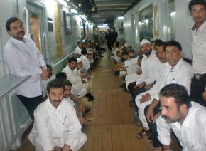 Occupying workers at the five-star Pearl Continental Hotel in Karachi