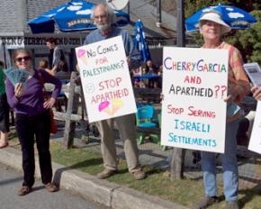 Palestine solidarity activists protest Ben & Jerry's during a free cone giveaway day