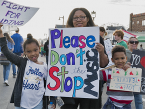 Several thousand teachers, students and parents rally to protest cuts